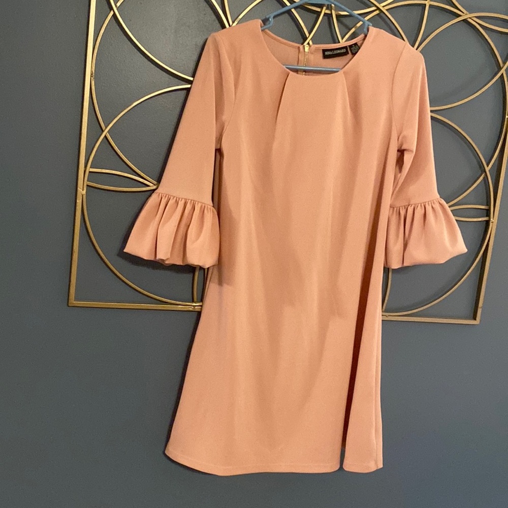 Light pink shirt dress with puff bell bottom sleeves